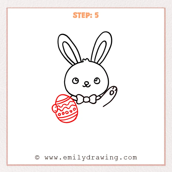 how to draw an easter bunny - The fifth stage of the Easter bunny drawing adds a decorated Easter egg on the left side, with stripes, wavy lines, dots, and a small bow.